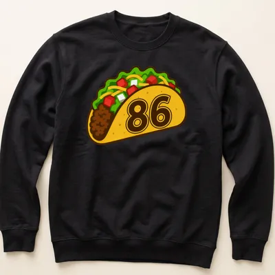 Cute kawaii taco graphic with playful text on — printed on a unisex sweatshirt