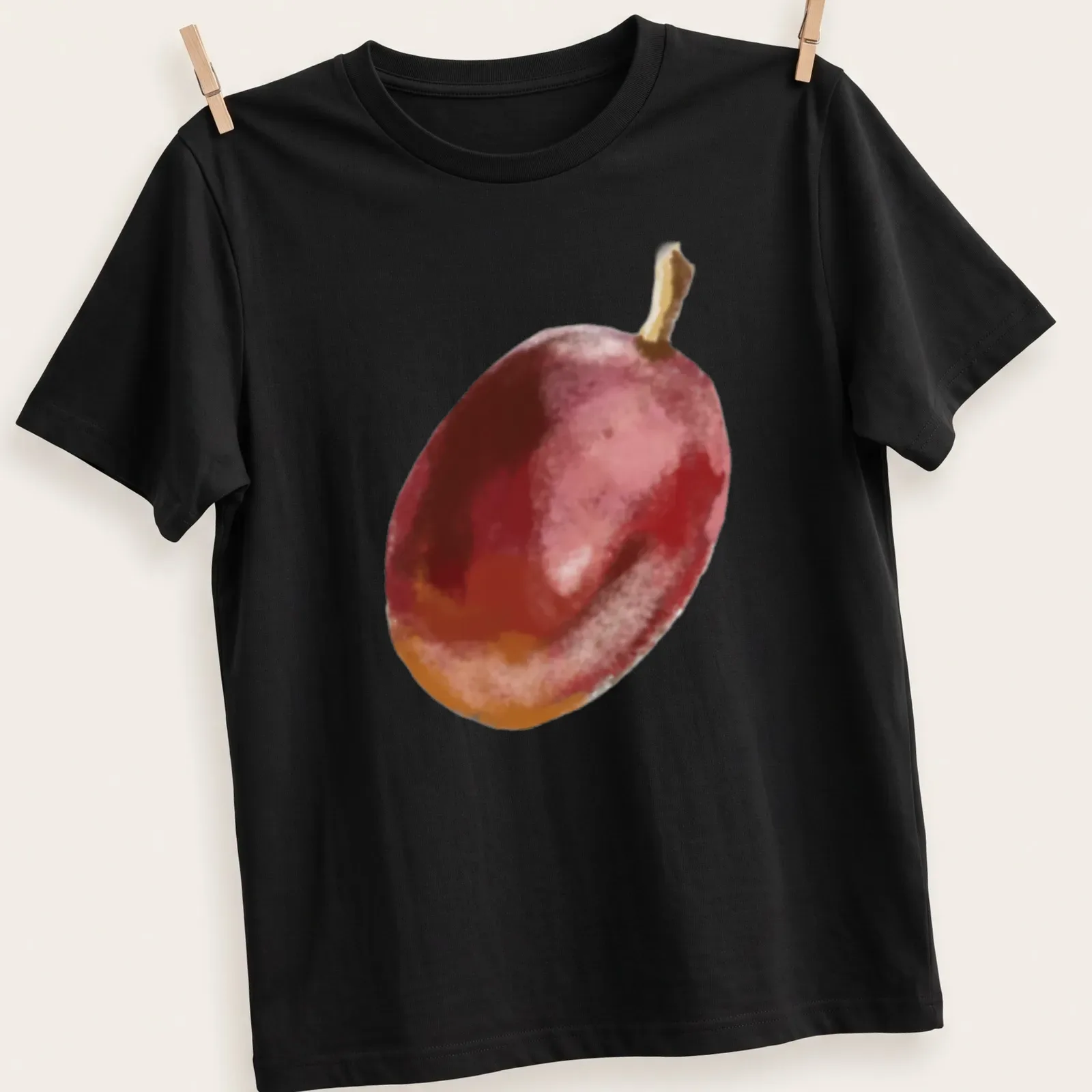 Watercolor print of grapes with the text A Grape in playful font — printed on a unisex t-shirt