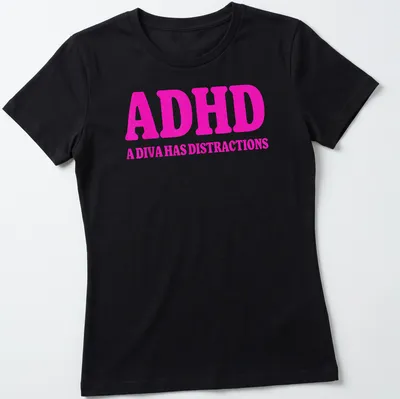 Funny retro t-shirt with text about ADHD and distractions in pink — printed on a women's shirt