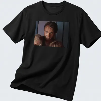 Realistic portrait of Alan Grant with children in warm tones — printed on a unisex t-shirt