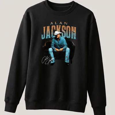 Vintage retro Alan Jackson t-shirt featuring a lounging illustration of the musician — printed on a unisex sweatshirt