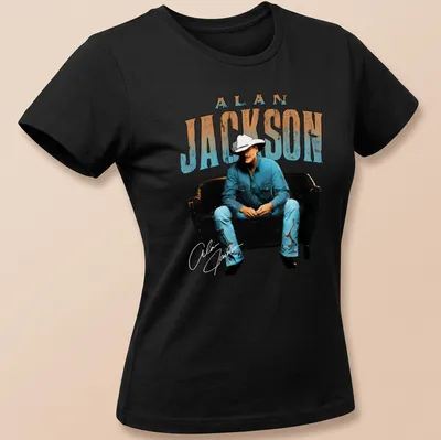 Vintage retro Alan Jackson t-shirt featuring a lounging illustration of the musician — printed on a women's shirt