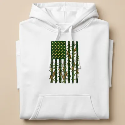 Vintage distressed t-shirt with American Flag over a corn field graphic — printed on a unisex hoodie