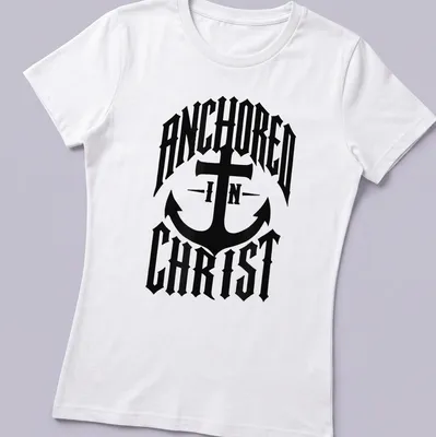 Bold typography Anchor design with 'ANCHORED IN CHRIST' text on black — printed on a women's shirt
