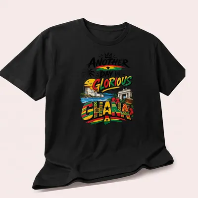 Vibrant Ghanaian landscape and symbols on a pride-themed shirt with colorful print. — printed on a unisex t-shirt (angled view)