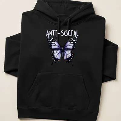 Realistic butterfly graphic with ANTI-SOCIAL text in black and colorful accents — printed on a unisex hoodie