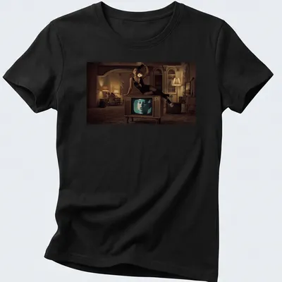 Retro graphic of a woman on a vintage television in beige and brown. — printed on a women's shirt
