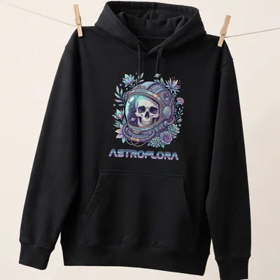 Colorful illustration of an astronaut skull surrounded by botanical elements in pastel colors — printed on a unisex hoodie