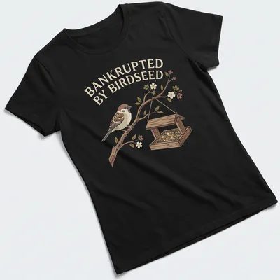 Illustrative t-shirt featuring a sparrow and the phrase 'Bankrupted By Birdseed' in earthy tones. — printed on a women's shirt