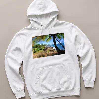 Vivid tropical landscape featuring a beach in Dorado, Puerto Rico — printed on a unisex hoodie
