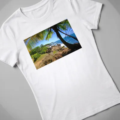 Vivid tropical landscape featuring a beach in Dorado, Puerto Rico — printed on a women's shirt