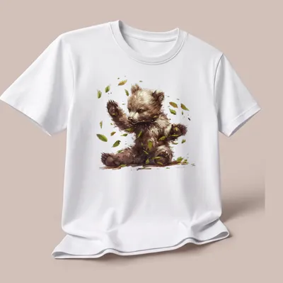 Watercolor illustration of a cute bear cub in a woodland setting — printed on a unisex t-shirt (angled view)