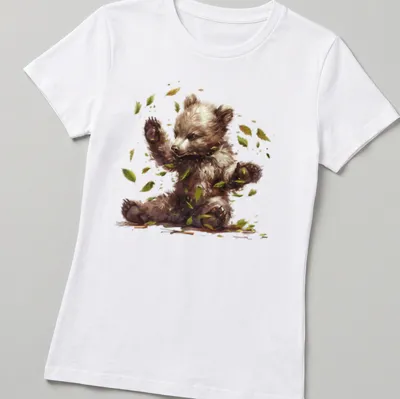 Watercolor illustration of a cute bear cub in a woodland setting — printed on a women's shirt