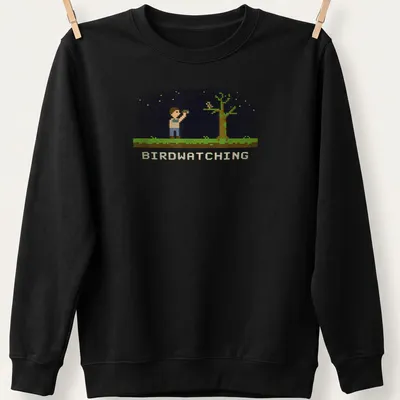 Retro pixel art of a bird watcher with binoculars and text reading Birdwatching — printed on a unisex sweatshirt