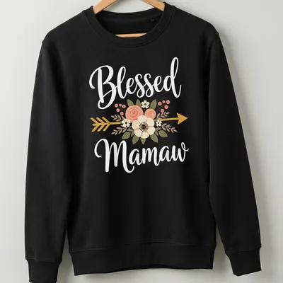 Floral design with arrow and text Blessed Mamaw in soft colors — printed on a unisex sweatshirt