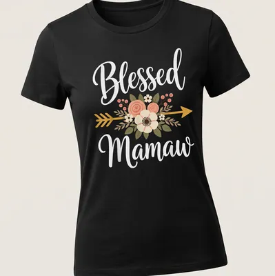 Floral design with arrow and text Blessed Mamaw in soft colors — printed on a women's shirt