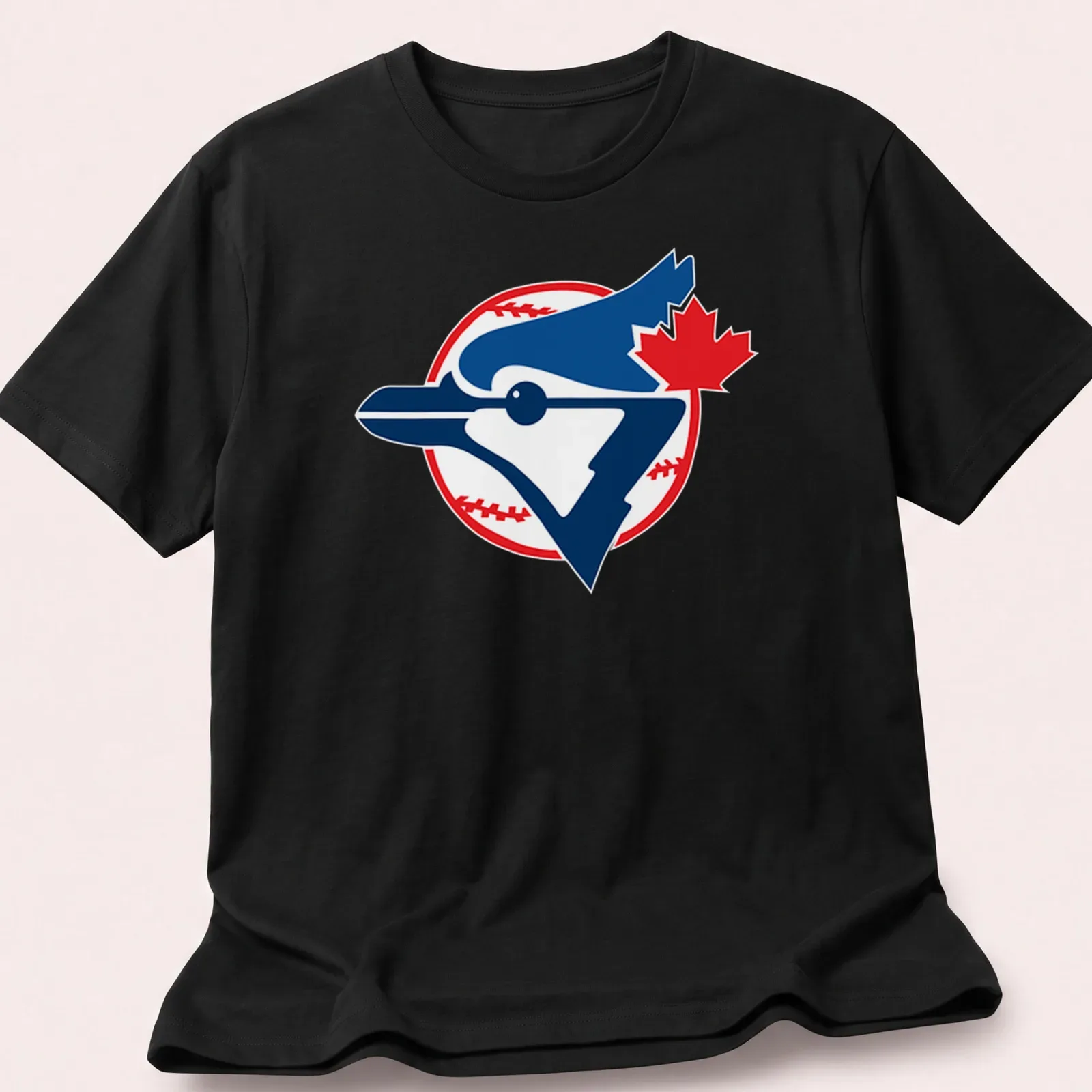 Bold graphic t-shirt featuring a blue jay bird with baseball elements — printed on a unisex t-shirt