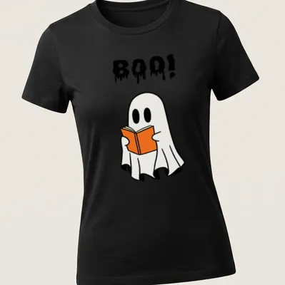 Cartoon ghost holding an orange book with the word Boo! above it — printed on a women's shirt
