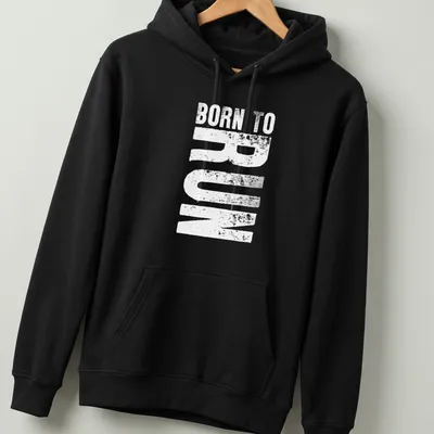 Bold typography shirt featuring the text Born To Run with running shoes graphic — printed on a unisex hoodie