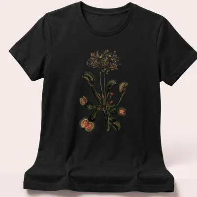Vintage botanical print featuring a variety of carnivorous plants in green, white, brown, and red — printed on a women's shirt