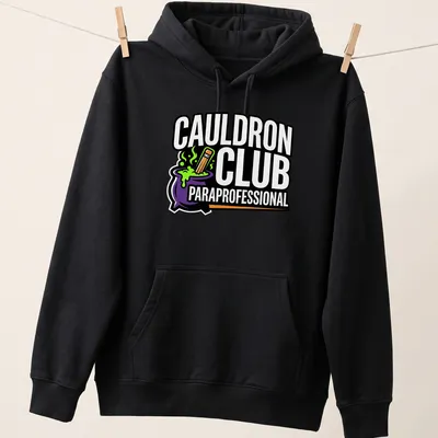 Bold Halloween T-shirt with Cauldron Club design and pencil illustration — printed on a unisex hoodie