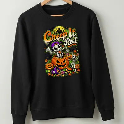 Colorful cartoon of skeletons and pumpkins with the text Creep It Reel for Halloween — printed on a unisex sweatshirt