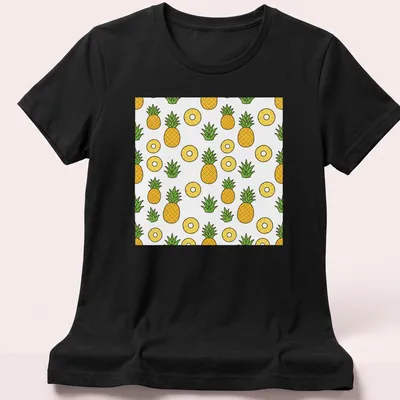 Kawaii pattern of cute pineapples in yellow and green on white. — printed on a women's shirt