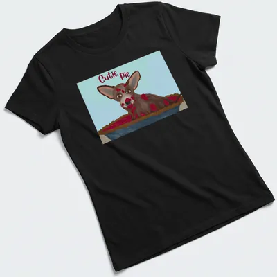 Whimsical illustration of a Chihuahua with the text 'Cutie Pie' in brown and cream colors — printed on a women's shirt