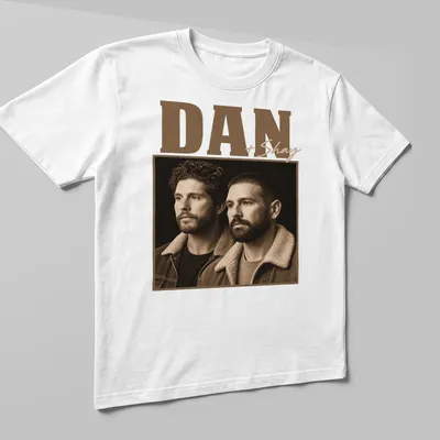 Vintage monochrome tee featuring a portrait of Dan and Shay in earthy tones — printed on a unisex t-shirt (angled view)
