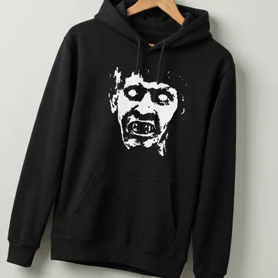 Distressed graphic t-shirt with Nicke Andersson's face and bold text — printed on a unisex hoodie