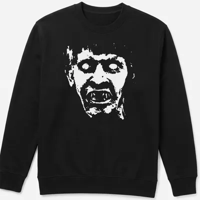 Distressed graphic t-shirt with Nicke Andersson's face and bold text — printed on a unisex sweatshirt