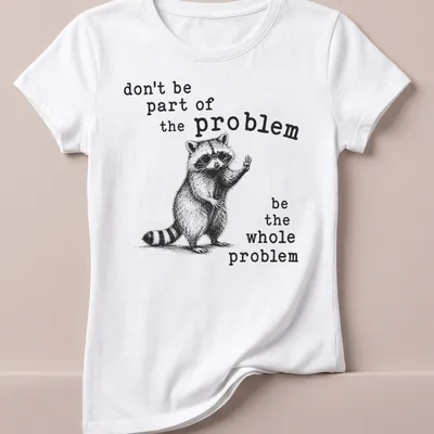 Vintage raccoon illustration with humorous text on a — printed on a women's shirt