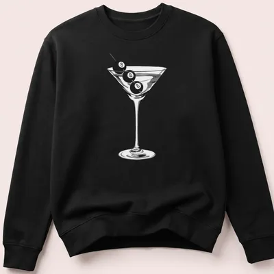 Minimalist design of a martini glass with an eight ball garnish — printed on a unisex sweatshirt