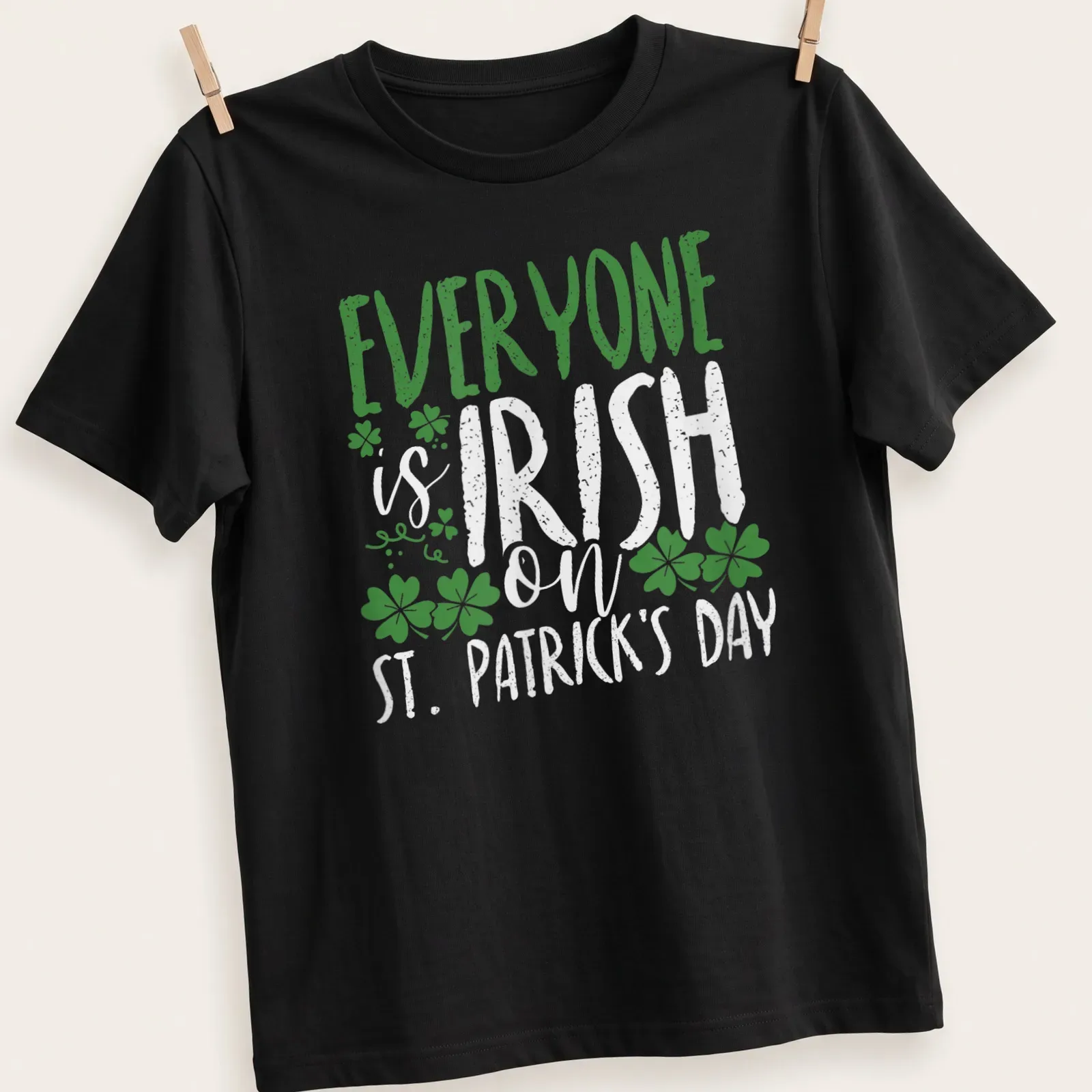 Vintage distressed T-shirt featuring shamrock and St. Patrick's Day text — printed on a unisex t-shirt