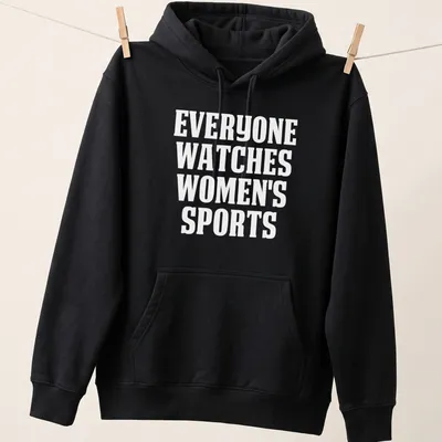 Bold typography t-shirt featuring the phrase 'Everyone Watches Sports' in black and white. — printed on a unisex hoodie