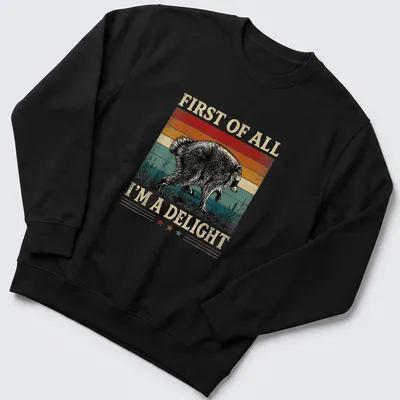 Vintage distressed t-shirt featuring a playful raccoon and humorous text. — printed on a unisex sweatshirt