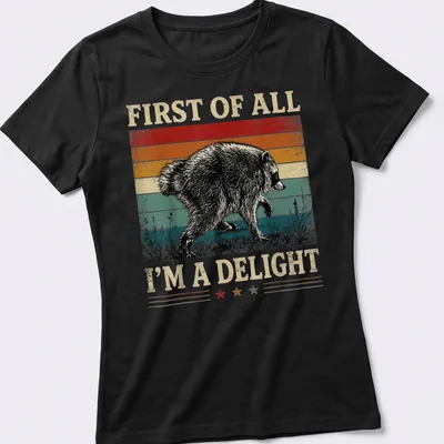 Vintage distressed t-shirt featuring a playful raccoon and humorous text. — printed on a women's shirt