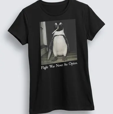 A humorous illustration of a smoking penguin with text about flying in black, white, and gray. — printed on a women's shirt