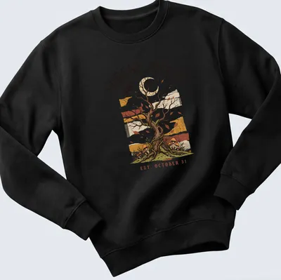 Vintage illustration of a tree with a crow and mushrooms, with text about Forest Witch — printed on a unisex sweatshirt