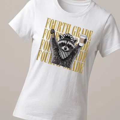 Bold graphic of a raccoon with pencil and coffee, with the text FOURTH GRADE — printed on a women's shirt