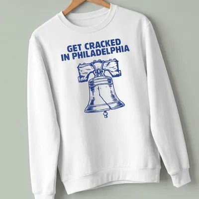 Illustration of the Liberty Bell with the phrase Get Cracked In Philadelphia in bold lettering. — printed on a unisex sweatshirt