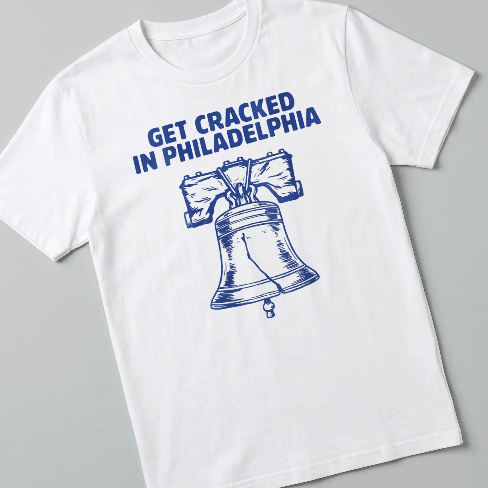Illustration of the Liberty Bell with the phrase Get Cracked In Philadelphia in bold lettering. — printed on a unisex t-shirt