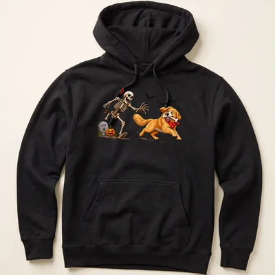 Cartoon Golden Retriever stealing a bone from a skeleton in Halloween colors — printed on a unisex hoodie