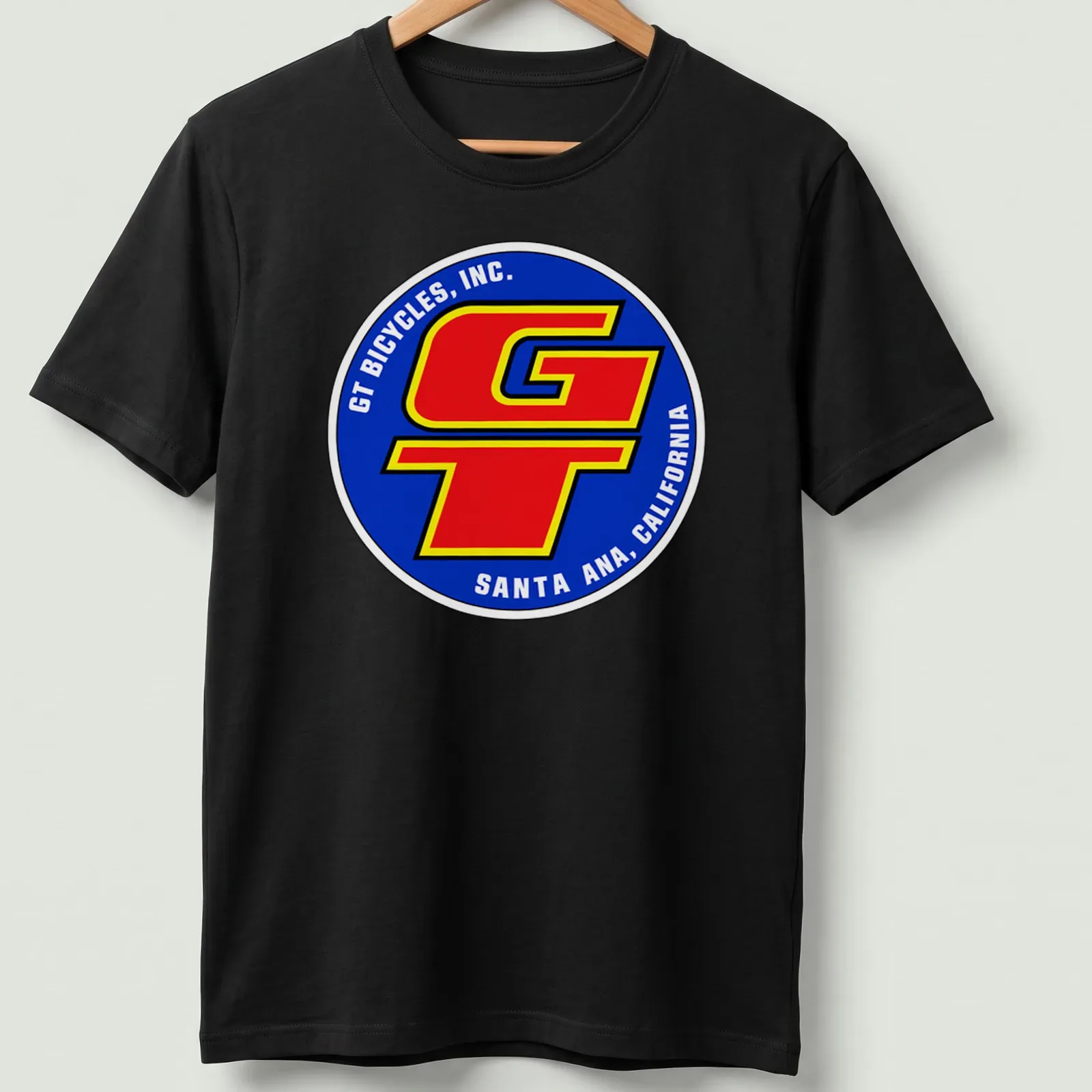 Vintage BMX T-shirt featuring GT Bicycles logo in blue, red, yellow, and white — printed on a unisex t-shirt