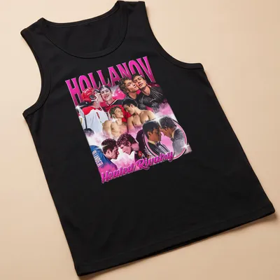 Vintage hockey t-shirt with players in action and bold text. — printed on a tank top
