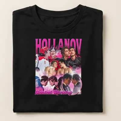 Vintage hockey t-shirt with players in action and bold text. — printed on a women's shirt