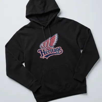 Vintage distressed t-shirt featuring the word Heritage and a wing graphic — printed on a unisex hoodie