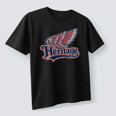 Vintage distressed t-shirt featuring the word Heritage and a wing graphic — printed on a unisex t-shirt (angled view)