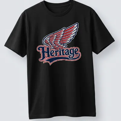 Vintage distressed t-shirt featuring the word Heritage and a wing graphic