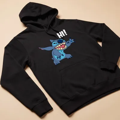 Cartoon tropical alien character with greeting text in blue and light blue — printed on a unisex hoodie